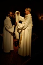 Receiving his stole from his uncle, Fr. John Reiker