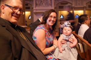 In church on Saturday, Uncle Gerard, Hannah and her mom Sarah awaiting the start of the big event.