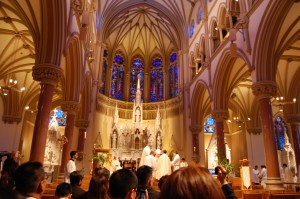 Archbishop Carlson anoints Chris' hands, sealing his priesthood with the gift of the Holy Spirit.