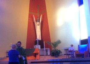 Sharing the Body of Christ with the faithful...